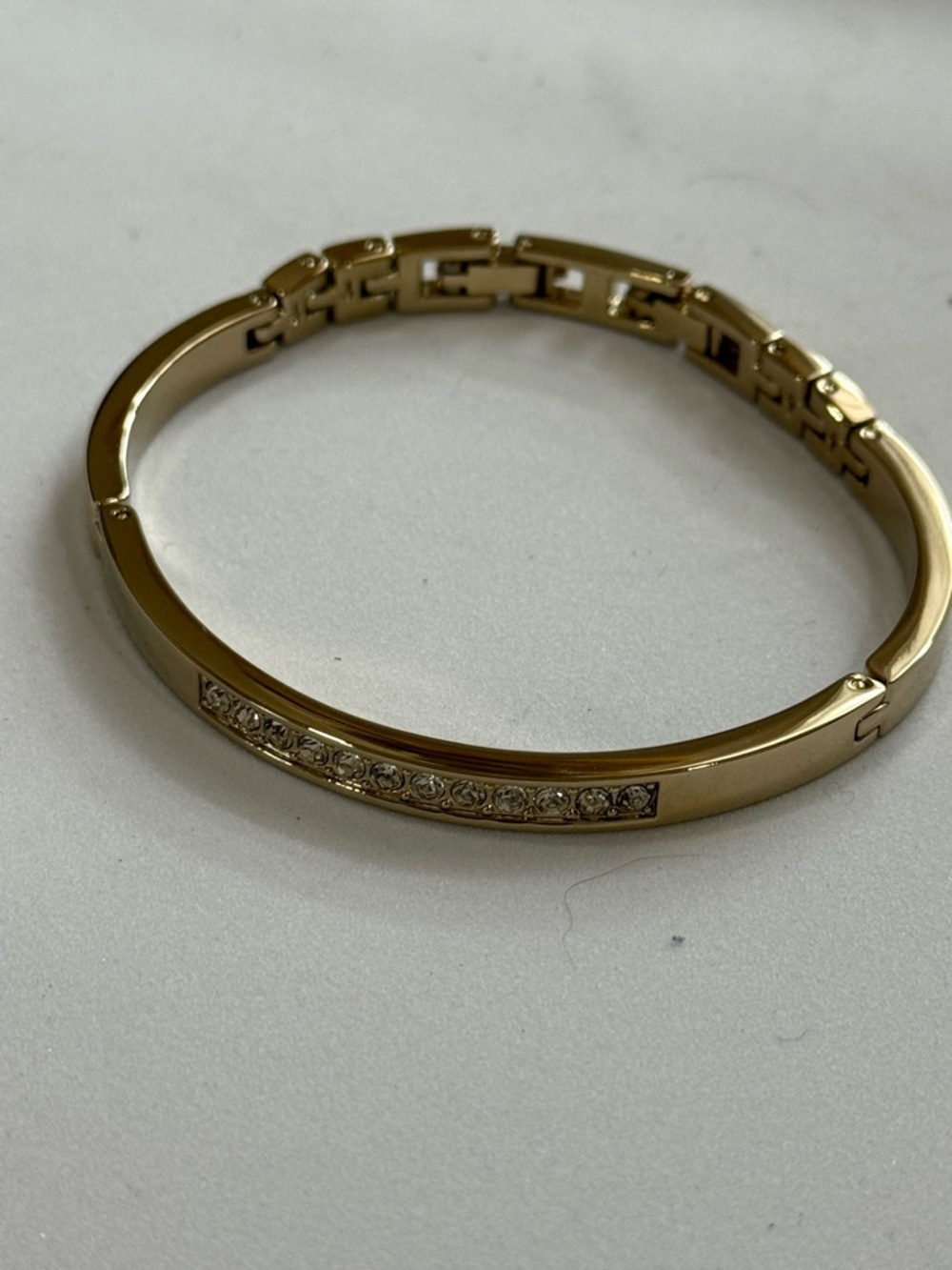 Anne Klein Gold-Tone Crystal Row Hinged Bangle Bracelet